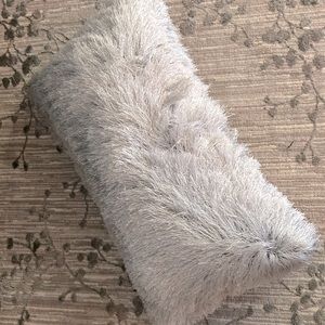 2 gray oblong throw pillows